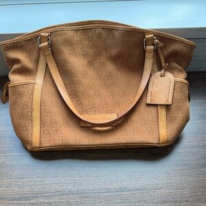 Dooney and Bourke tan signature tote with leather trim and pink interior